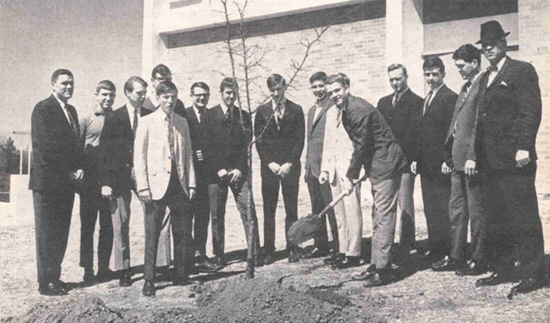 Members of the world's first Rotaract club planting a tree on the University of North Carolina campus to mark each new Rotaract country